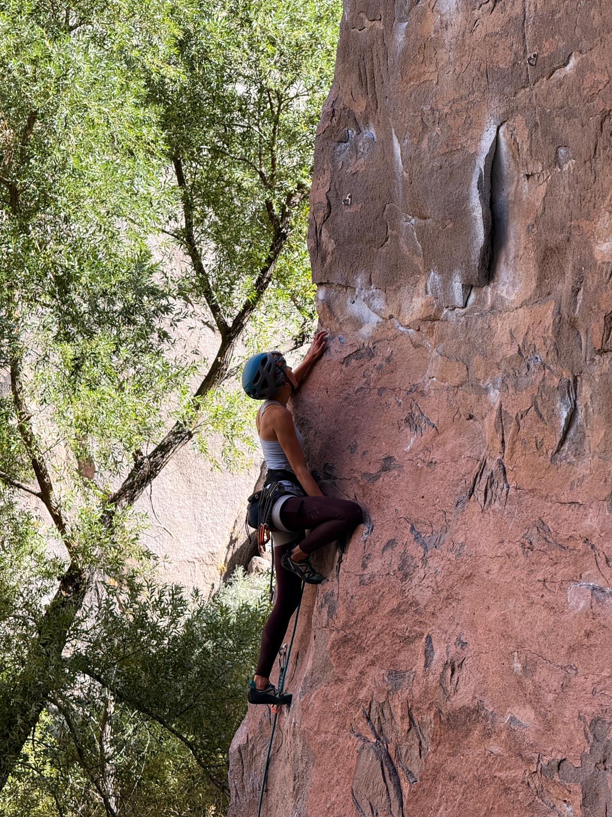 Janice rock climbing